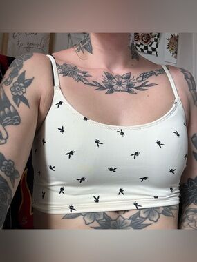 cream playboy tank